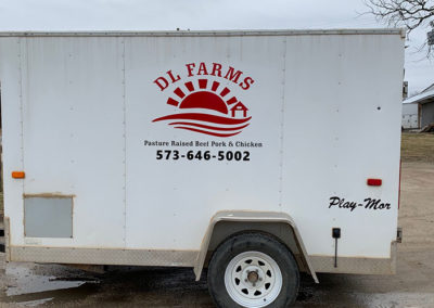 Picture of vinyl decal and lettering on DL Farms Trailer.
