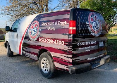 Image showing a vehicle wrap on a 63 Auto and Truck Parts van.